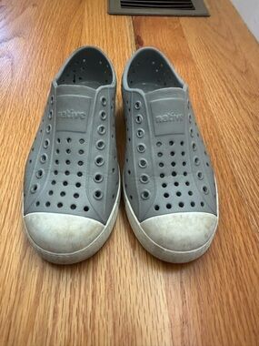 Native Unisex Slip-On Sneakers in Gray with White Toe Caps